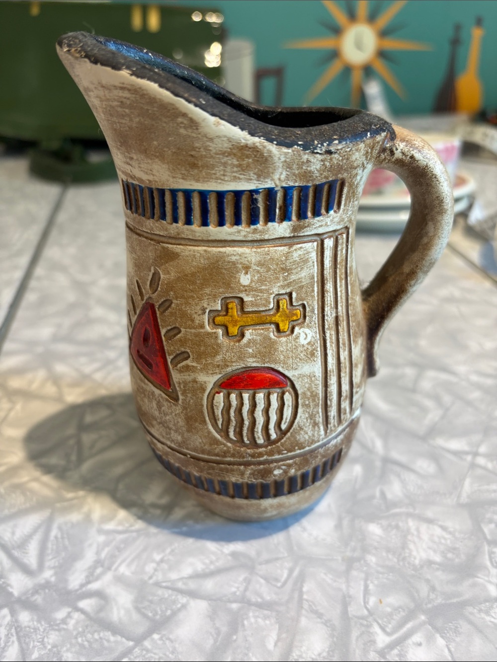 vintage ceramic pitcher features a Southwestern Native American design. Mexican